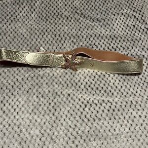 Lilly Pulitzer gold leatherr belt with a pink and green  jeweled starfish. EUC!